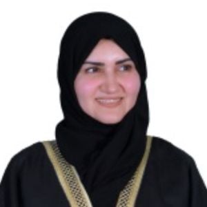 Zainab Alamin speaking at Connected World KSA