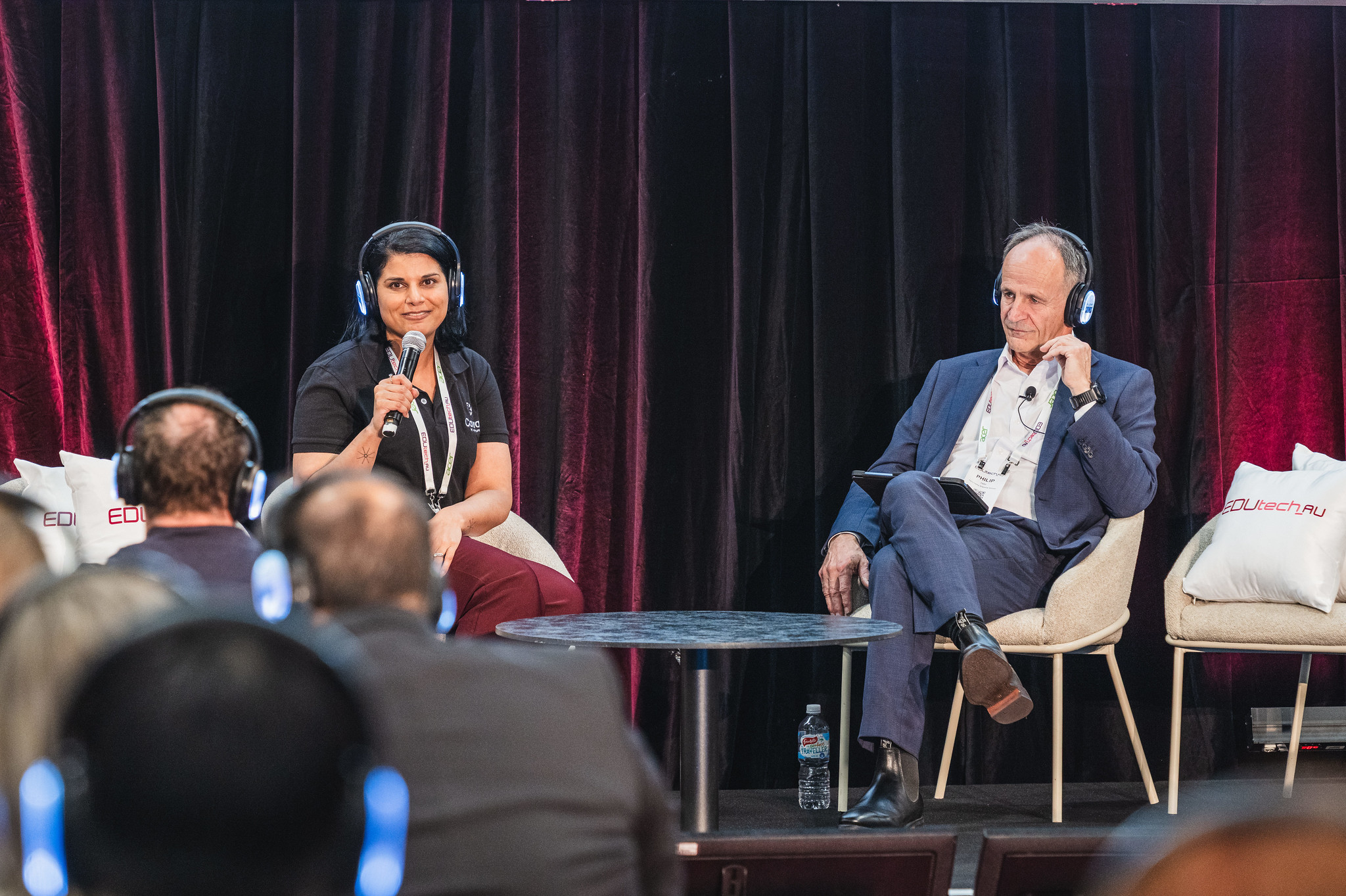 Panel speakers in conversation on stage at EDUtech AU