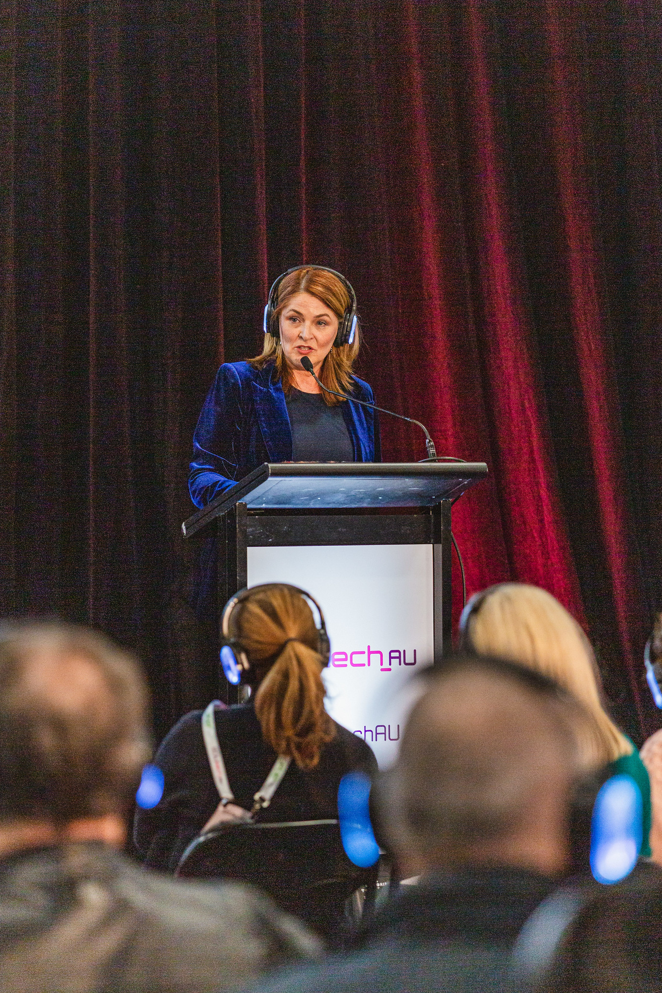 A speaker addressing the audience from the podium at EDUtech AU