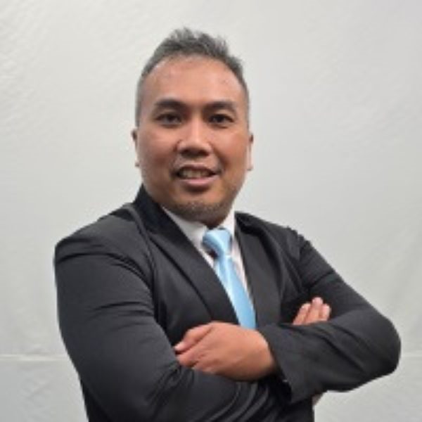 Ricky Adrian speaking at EV Live Indonesia