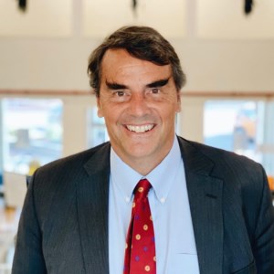 Tim Draper speaking at MOVE 2025