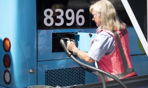 Add electric bus charging photo here
