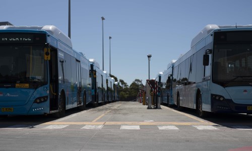Add electric buses at depot photo here
