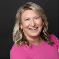 Kim Smithers | CMO | IQ Fiber » speaking at Connected America